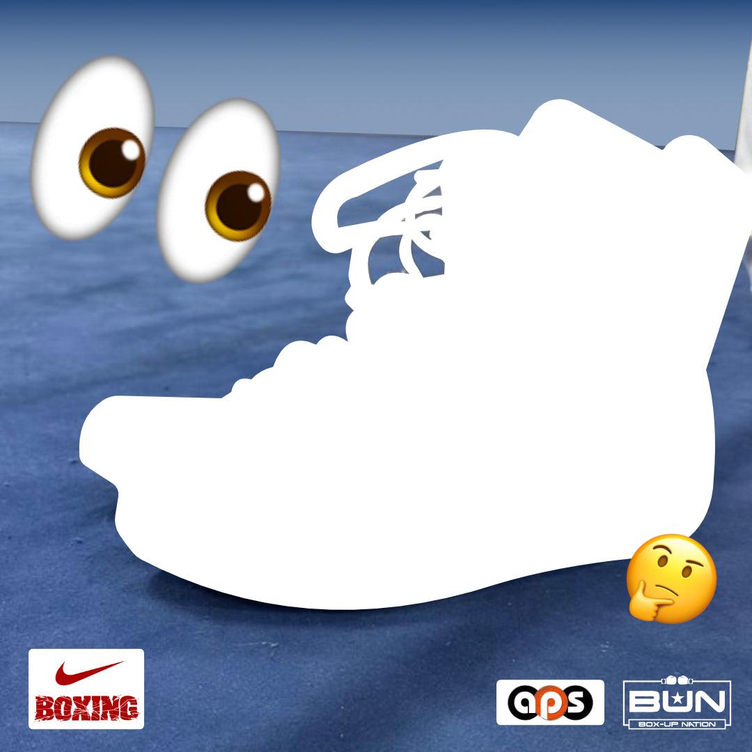 Silhouetted boxing shoe on blue mat with Nike Boxing and Box-Up Nation logos, emoji graphics