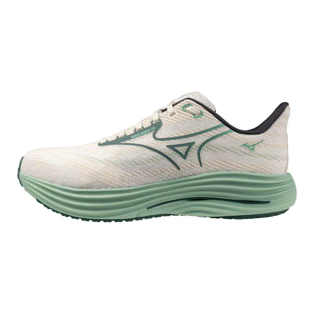 White and green running shoe on a white background