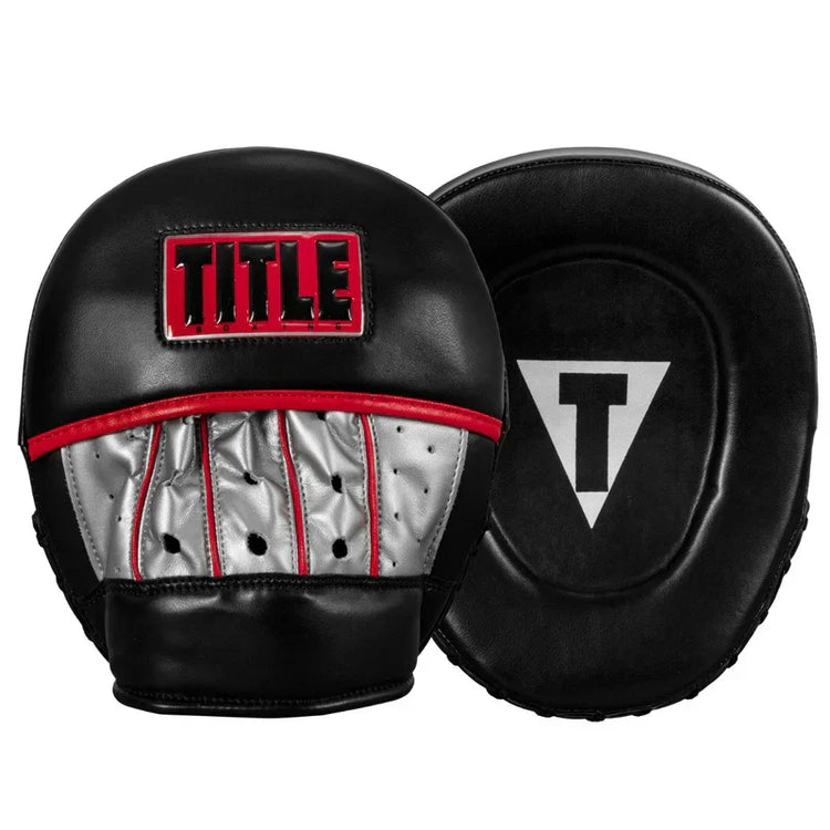 Black, grey, and red boxing focus mitts with TITLE logo and ventilation holes