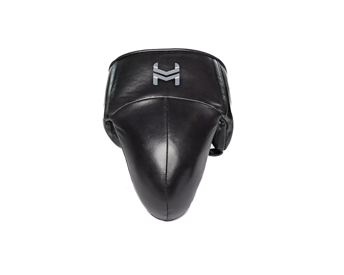 Black leather boxing groin protector with silver logo, pro-grade boxing equipment