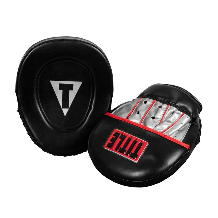 Black and silver boxing focus mitts with TITLE logo, ideal for boxing training